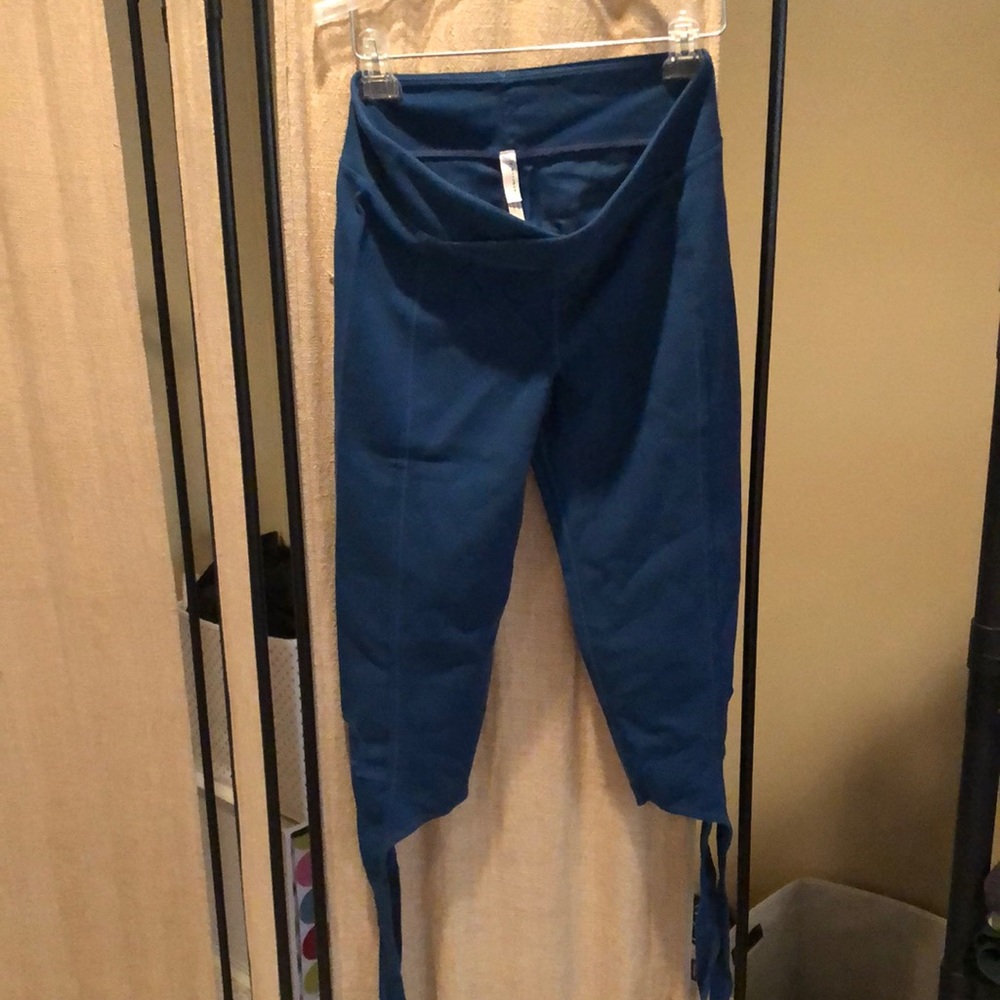 Teal mid calf tie up at the bottom - free people movement work out pants.